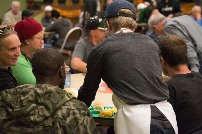 A hot meal served in the Food & Care Coalition dining room