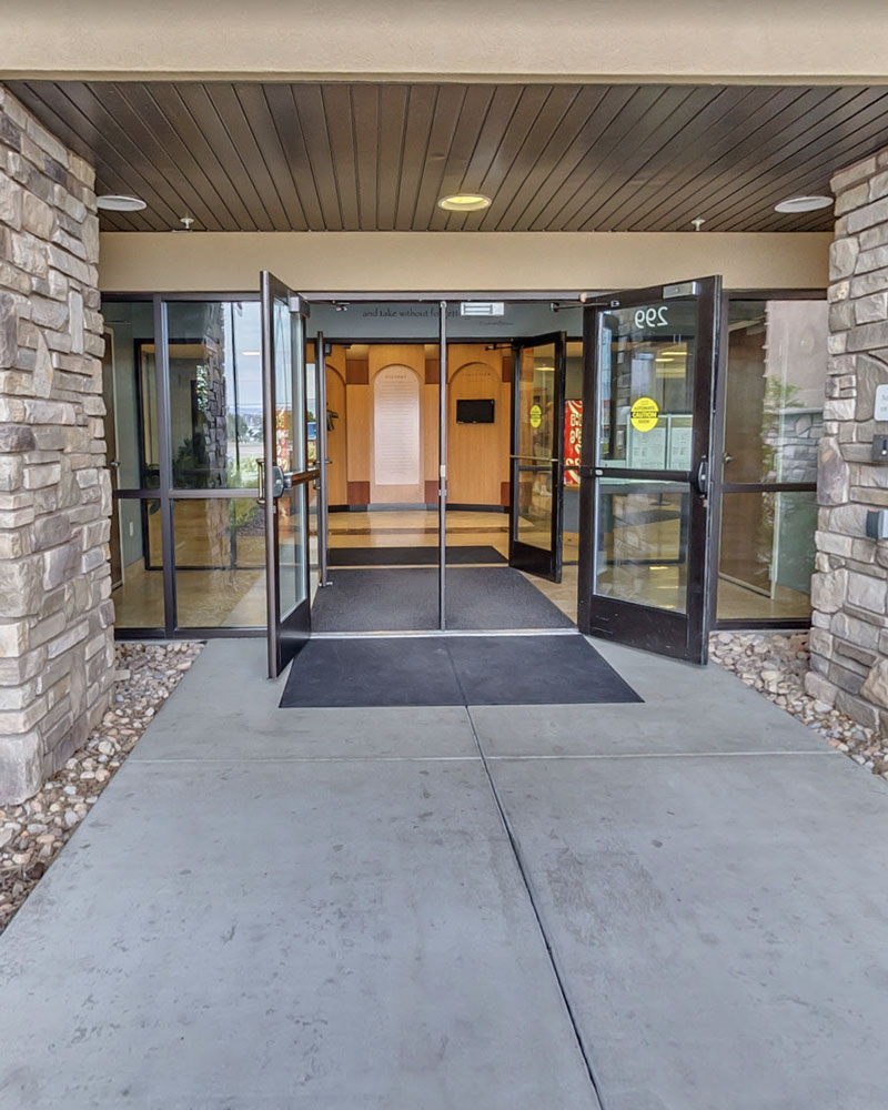 Hands coming together in a gesture of community support